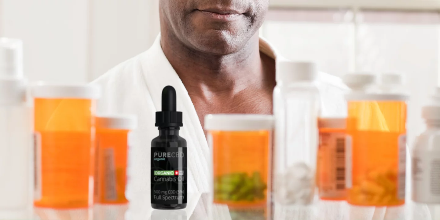 CBD and drug interactions, a man looking in his medicine cabinet