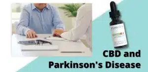 main artwork for the article on CBD and Parkinson's Disease. There is a man with a doctor looking over some paperwork. There is a bottle of CBD on the right hand side.